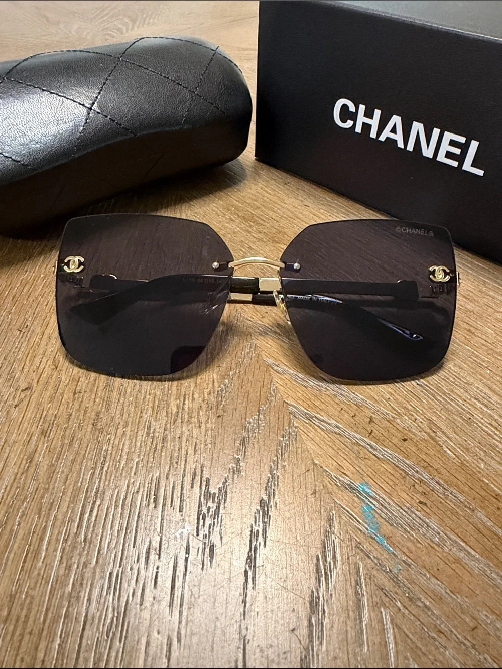 CHANEL Black Gradient Rimless Square Sunglasses with Gold Hardware